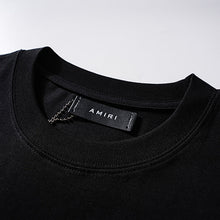 Amiri T Shirts Red text