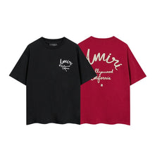 Amiri T Shirts Red text