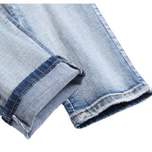 Amiri Jeans Ripped Stretch Jeans