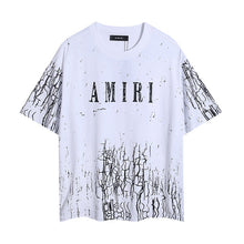 Amiri T Shirts Specks of starlight scattered like splashed ink.